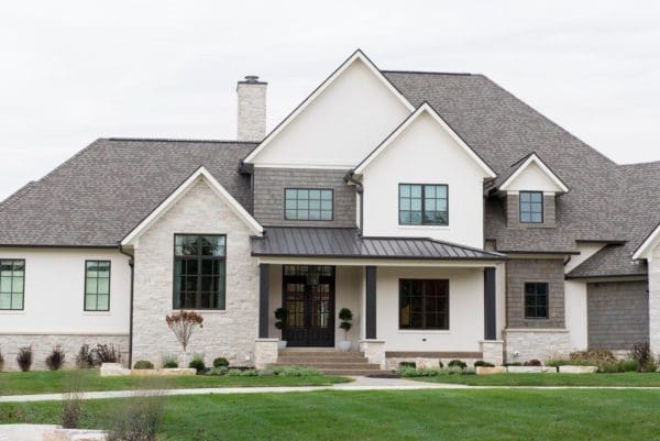 Home exterior featuring Quarry Mill's Empire Split Face Limestone with a white mortar joint.