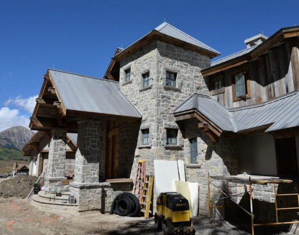 Residential Home with Custom Charcoal Bluff Natural Stone Veneer Exterior Siding