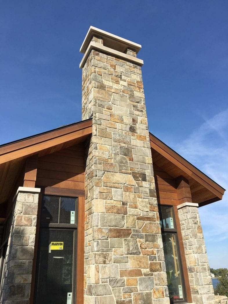 Exterior masonry with natural thin stone veneer