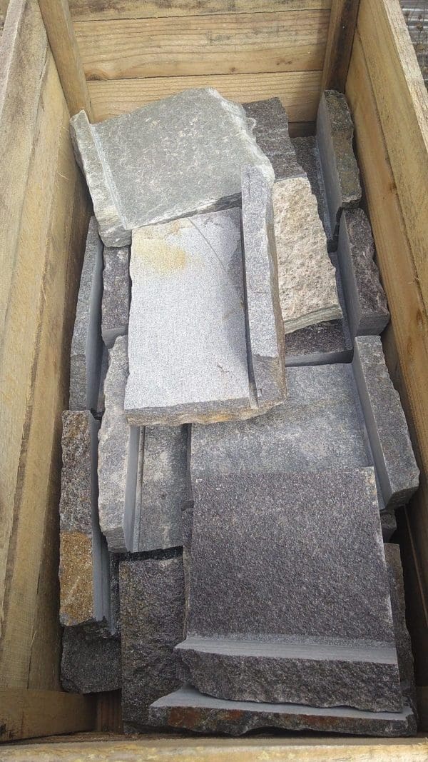 A stock crate of natural stone veneer corners