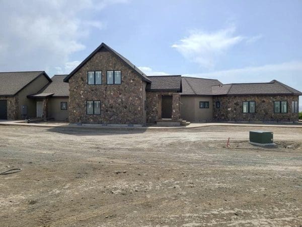 Home Exterior with Moss Rock Mosaic Stone Veneer