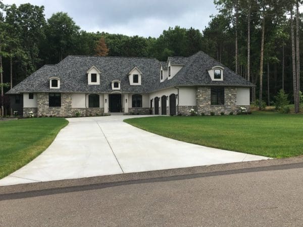 Ranch Style Home Exterior with Bismarck Natural Stone Veneer