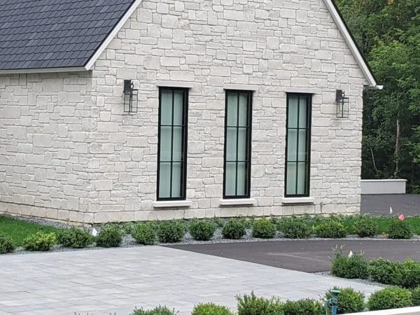 Exterior Siding with Montreux White Natural Stone Veneer