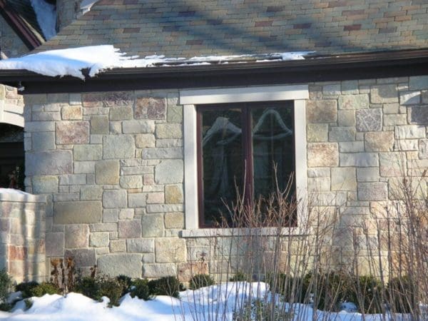 Home Exterior with Sheridan Real Limestone Thin Veneer