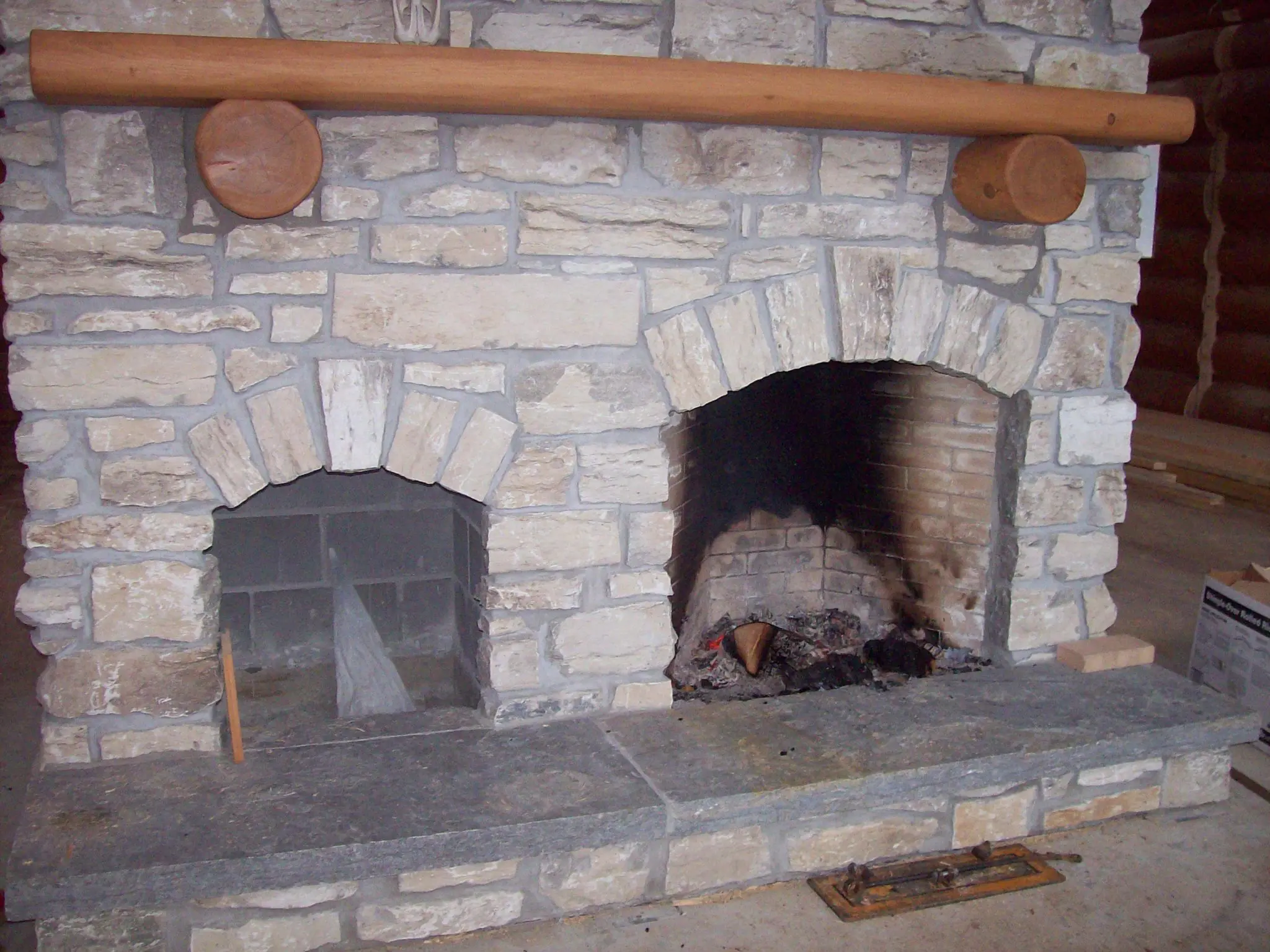 Rustic Fireplace with Door County Fieldstone
