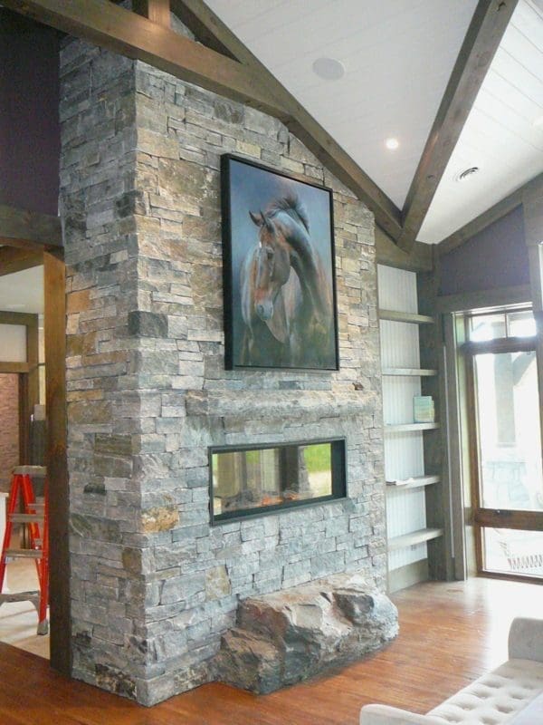 Double Sided Interior Fireplace with Logan Natural Stone Veneer