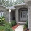 Home Exterior with Seaside Natural Stone Veneer