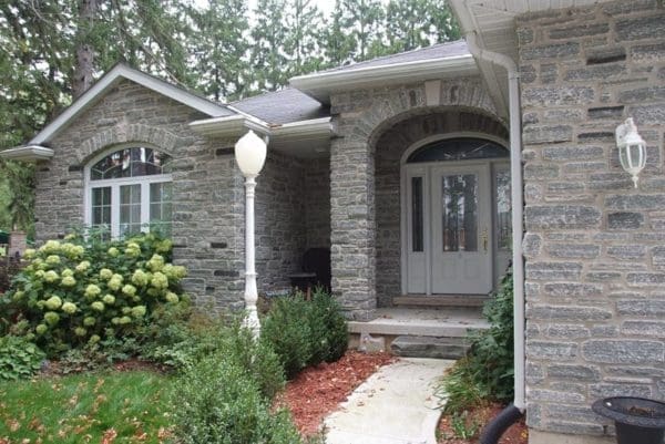 Home Exterior with Seaside Natural Stone Veneer