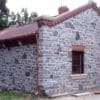 Home Exterior with Timmins Natural Thin Stone Veneer