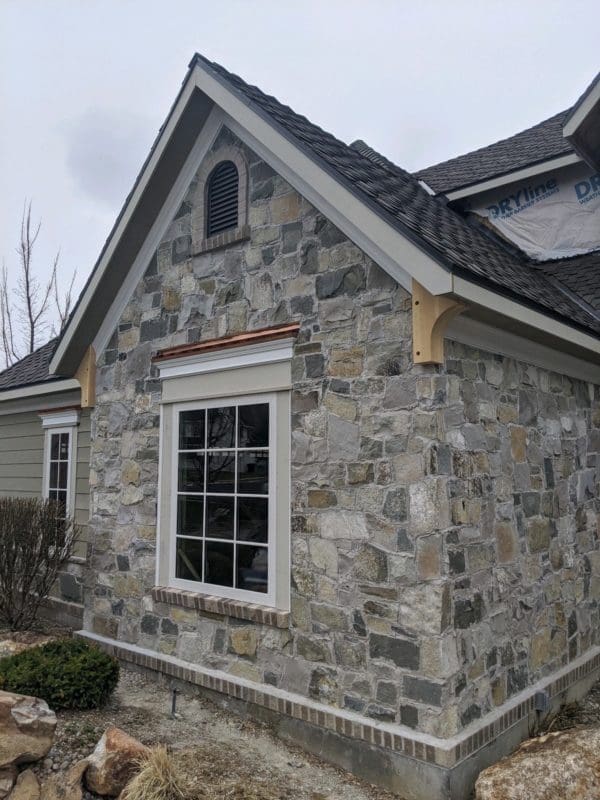 Home exterior with Olympia natural stone veneer