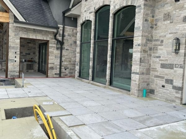 Backyard exterior with Graphite natural thin stone veneer