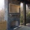 Covered patio and outdoor fireplace with Augusta natural legestone veneer
