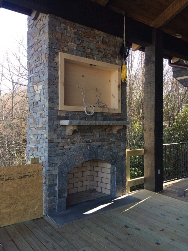 Covered patio and outdoor fireplace with Augusta natural legestone veneer