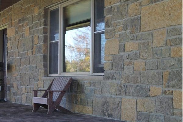 Front porch accent wall with Castle Ridge and Baltic Hills natural stone veneer