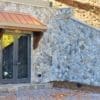 Exterior landscape wall with Cheyenne real thin stone veneer