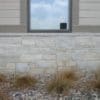 Close-up commercial wainscoting with Empire real stone veneer