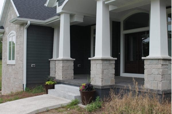 Front porch with Fond du Lac real thin stone veneer pillars
