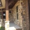 Front porch exterior siding with Hillsborough ashlar style natural stone veneer