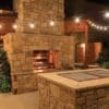 Outdoor patio and fireplace with Newcastle dimensional natural thin stone veneer