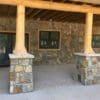 Covered patio with Rochester castle rock style real thin stone veneer