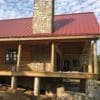 Log cabin siding with Rochester real thin stone veneer