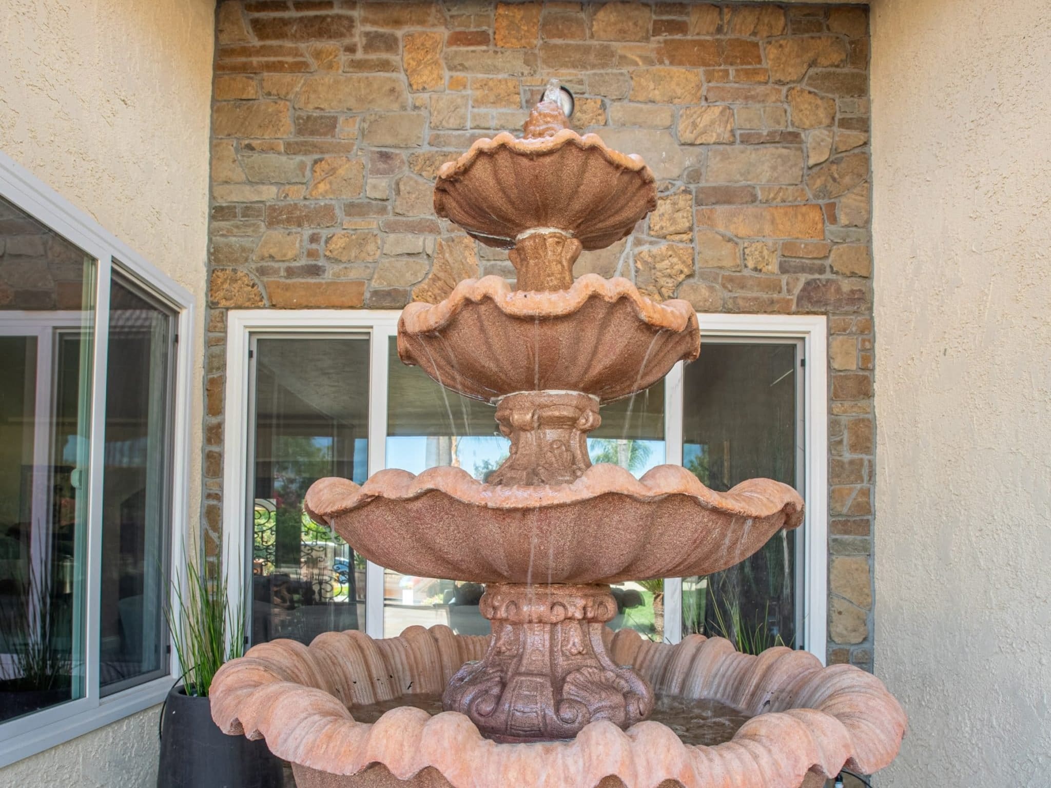 Cabernet Natural Stone Veneer Accent Wall with Fountain