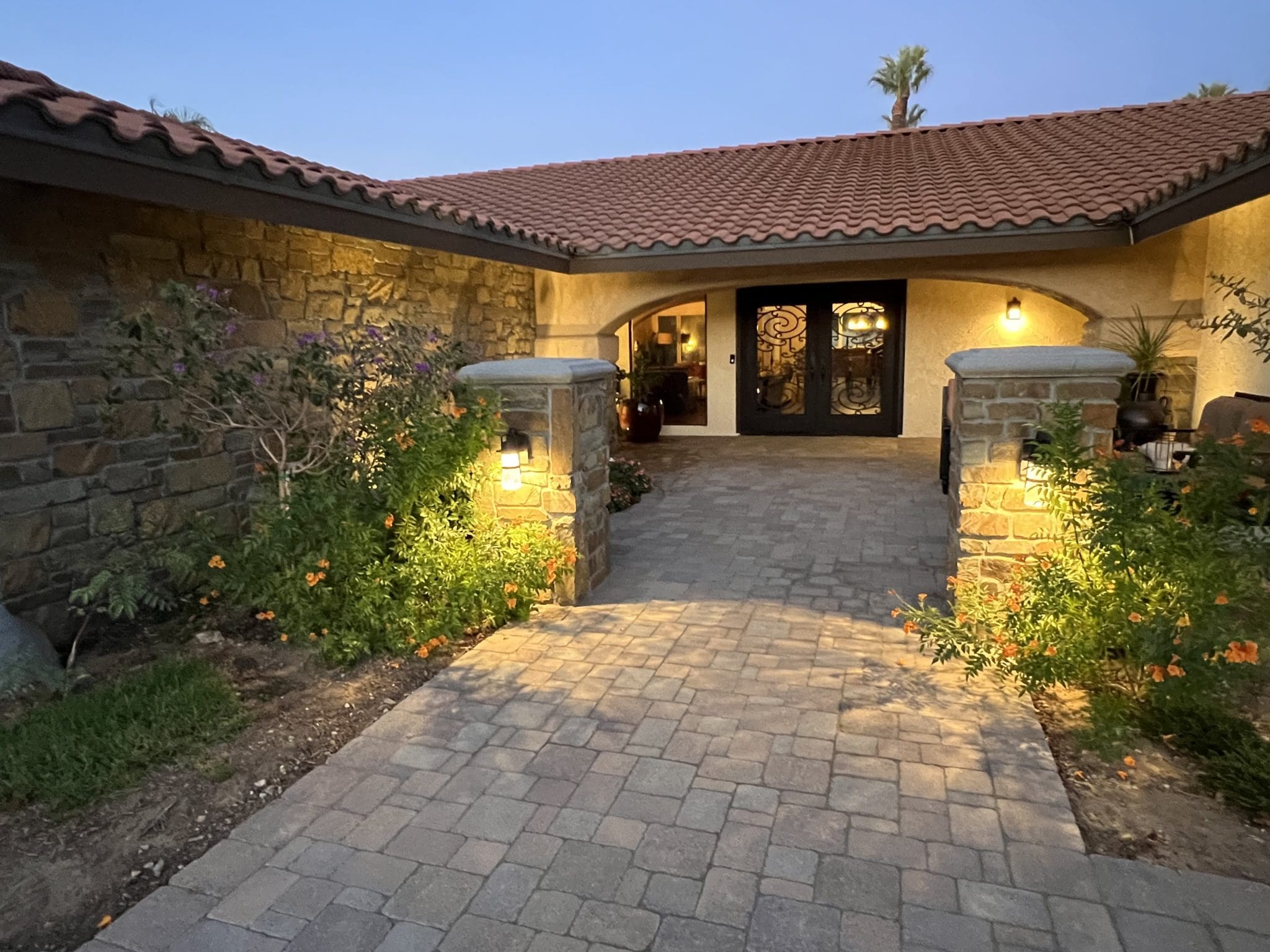 Cabernet Natural Thin Stone Veneer Front Entrance at Twilight