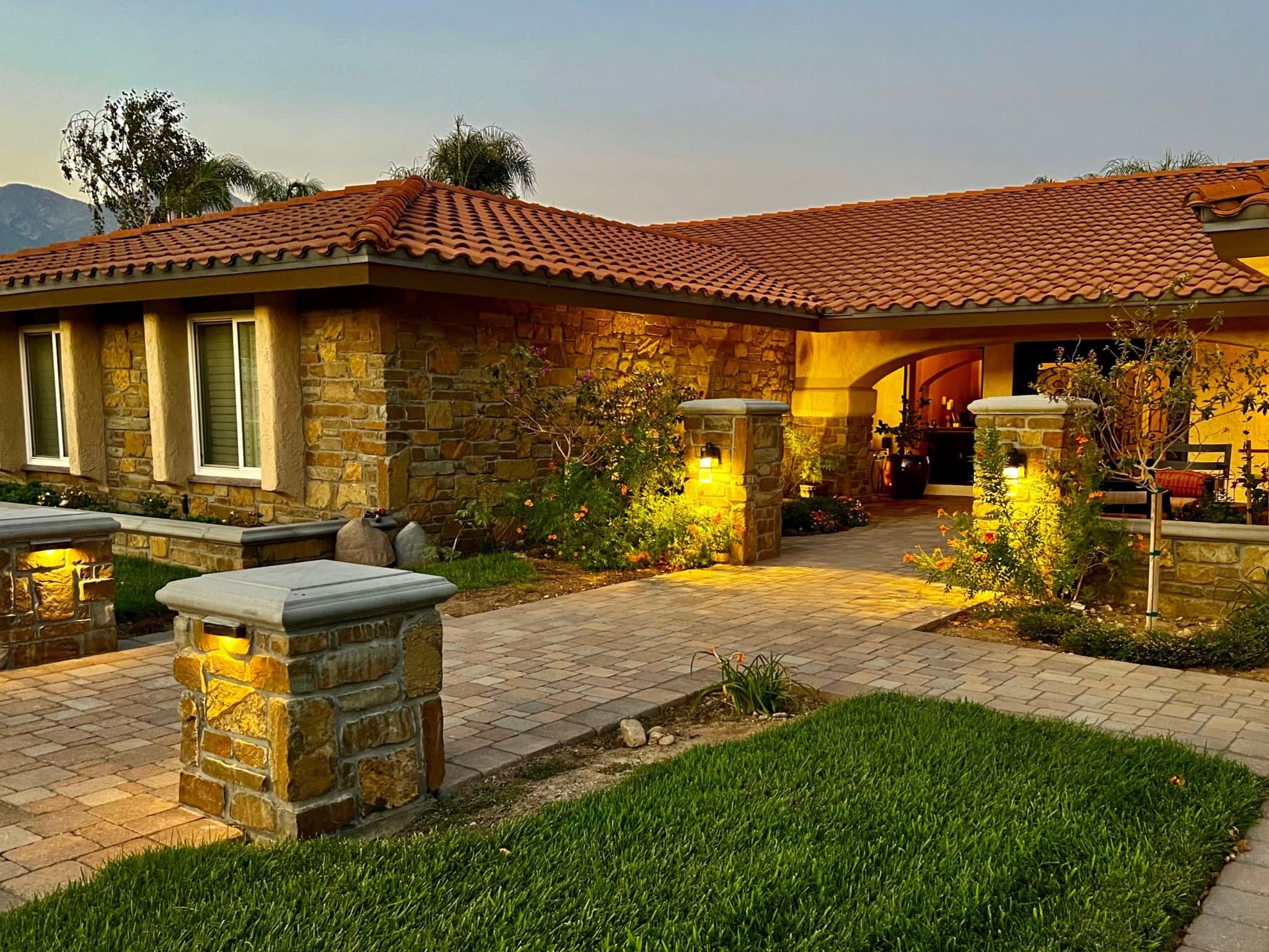 Cabernet Natural Thin Stone Veneer Home Exterior at Twilight