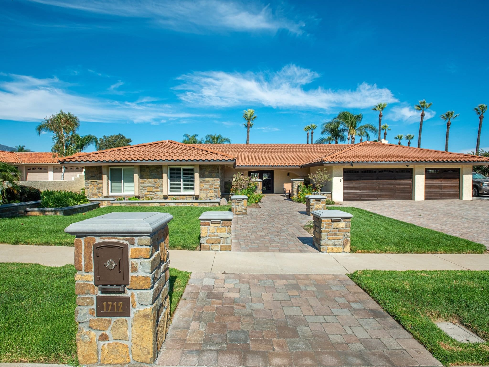 Mediterranean Home Exterior with Cabernet Real Stone Veneer