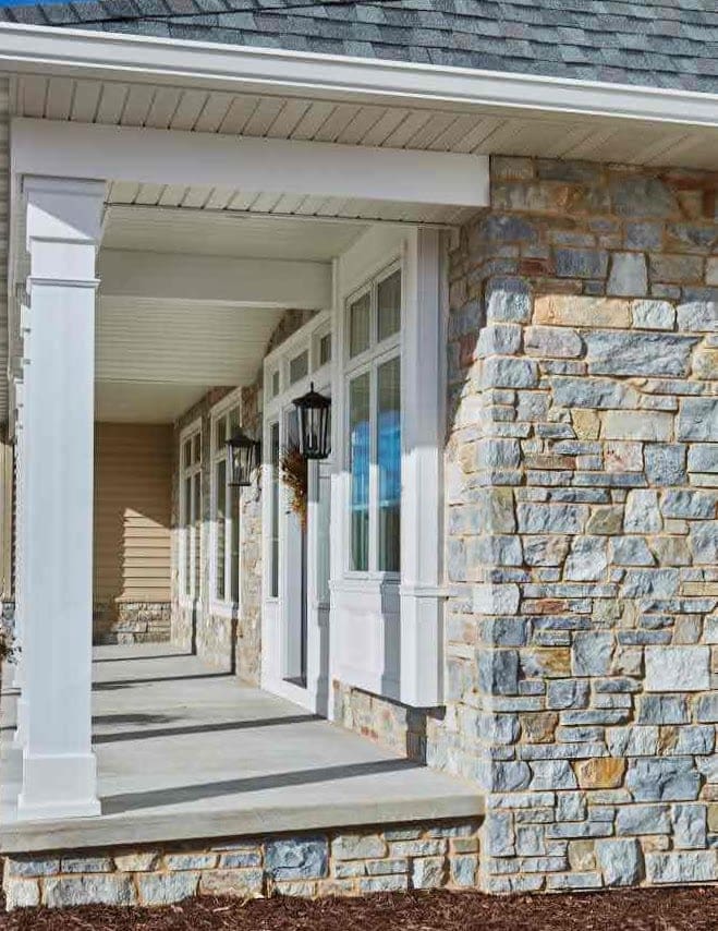 Chamberlain Natural Stone Veneer Exterior with Tan Mortar