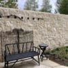 Athens Natural Thin Stone Veneer Custom Castle Rock Style Privacy Wall with Cream Mortar
