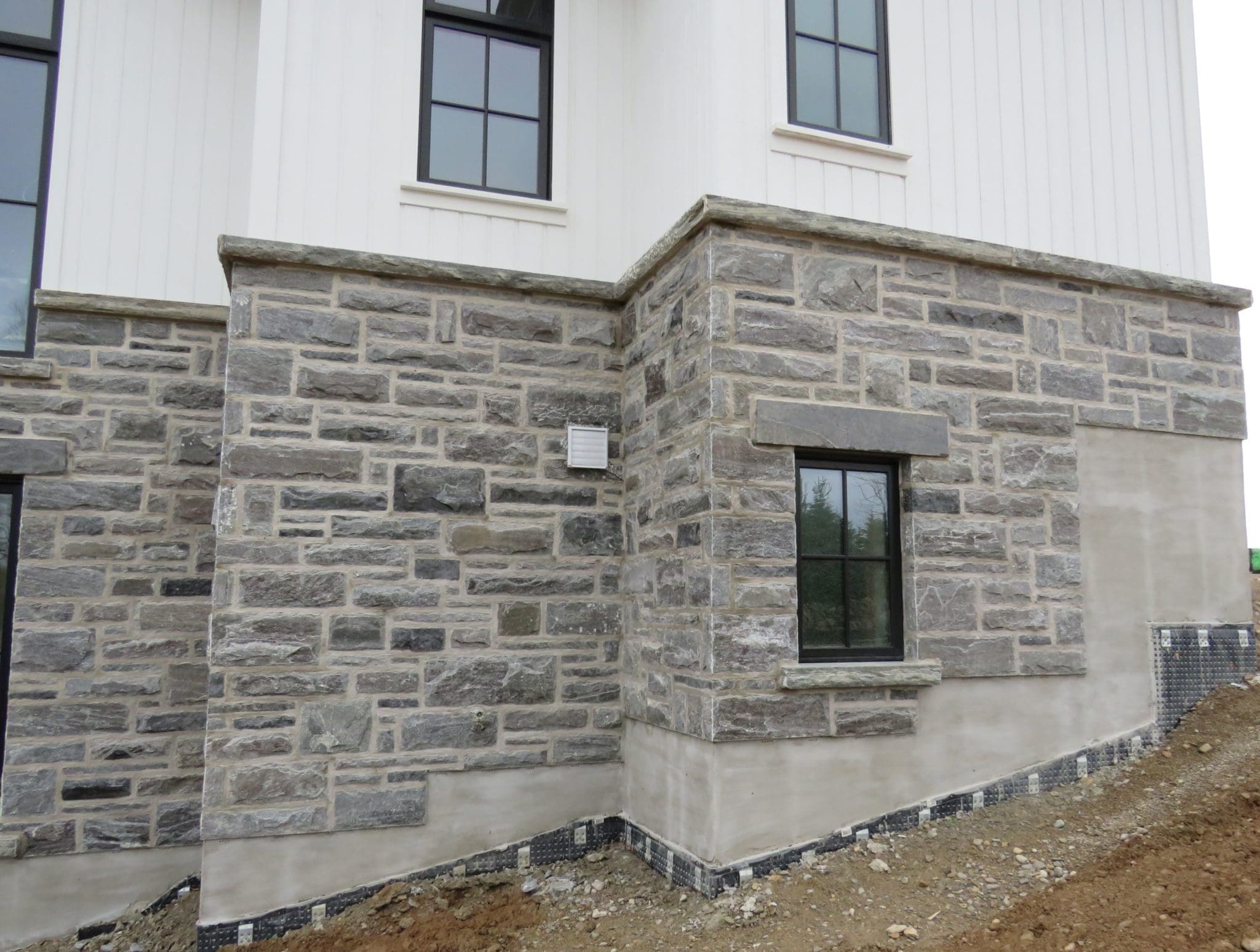 Pembroke Real Thin Stone Veneer Exterior with Light Mortar Flush Joint