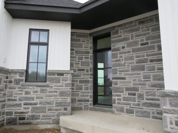 Pembroke Real Thin Veneer Stone Exterior with Light Mortar Flush Joint