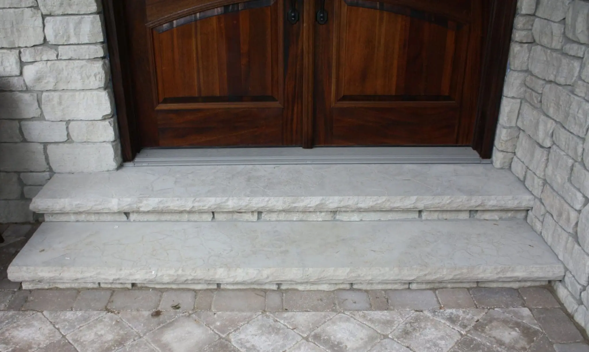 Stratford Real Stone Veneer Front Entrance with Custom Light Tones Only and Cut Stone Steps