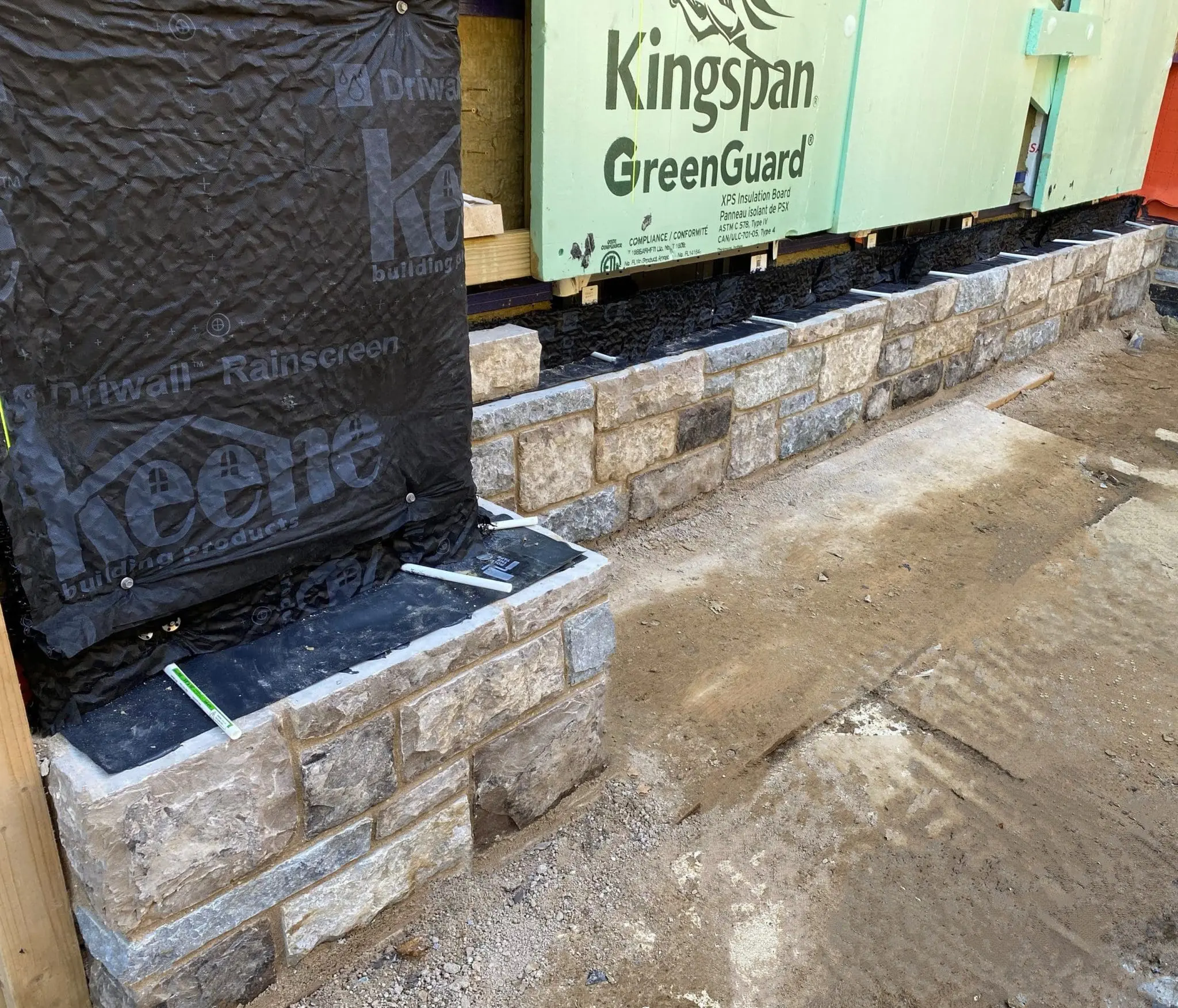 Jacksonport Custom Tumbled Real Thin Stone Veneer Wainscoting Installation in Progress